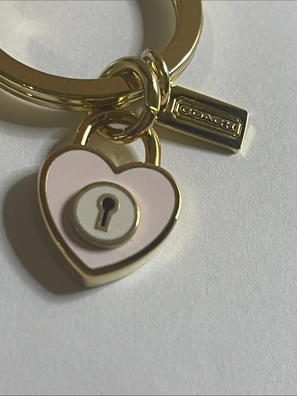 Coach Gold Heart Lock Keychain with Pink Enamel Accent and Coach Pen